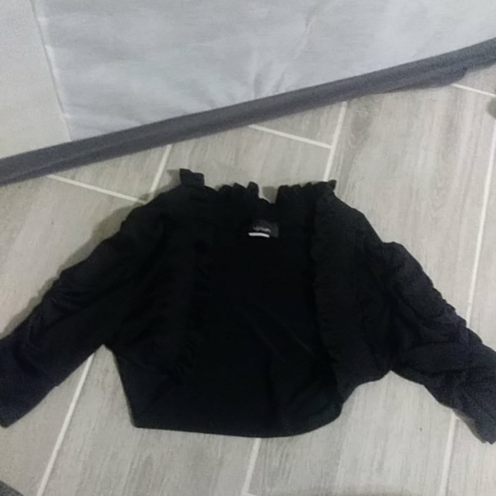 Black shrug